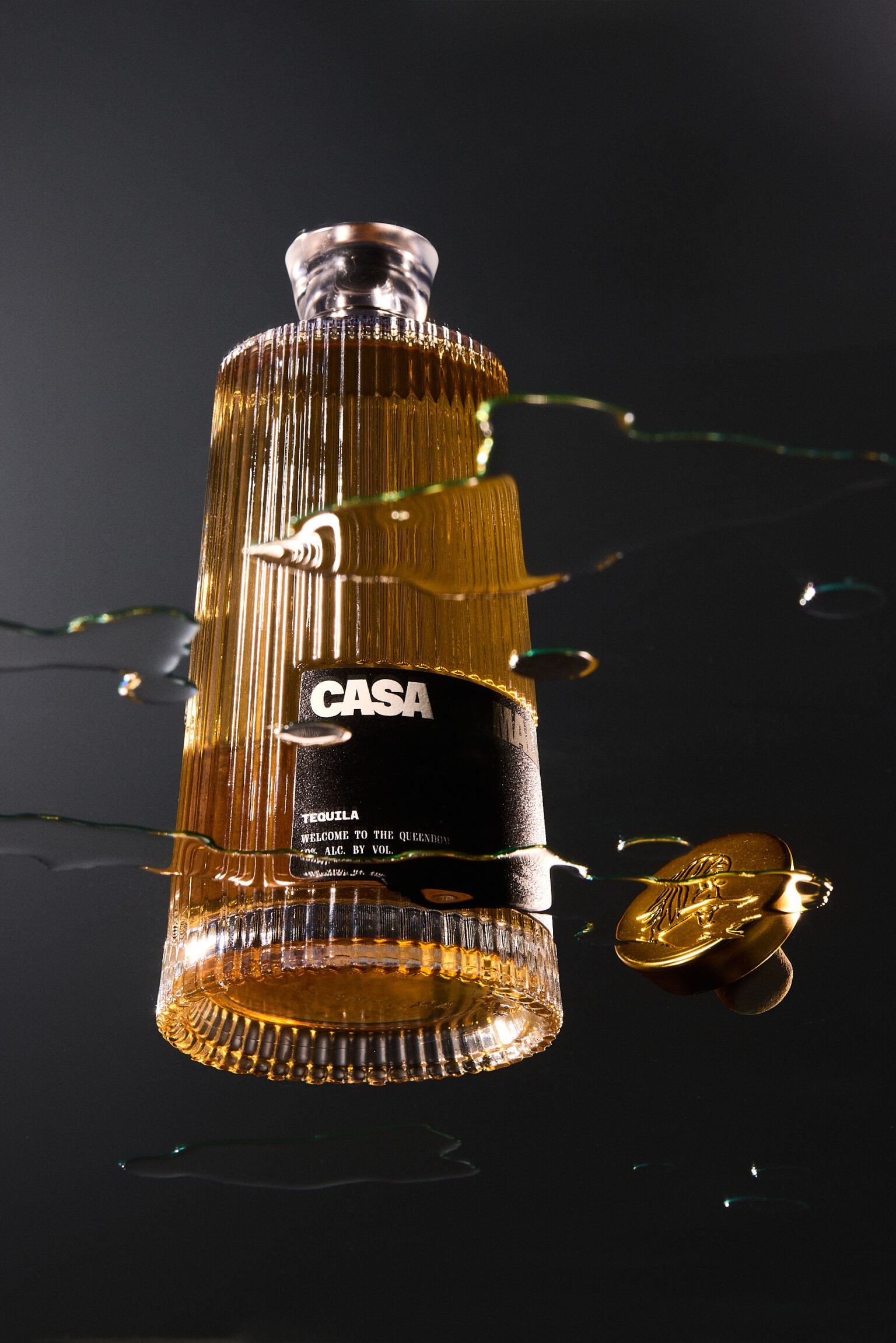 Casa Malka Reposado Tequila bottle with gold accents and sleek design, showcasing premium quality