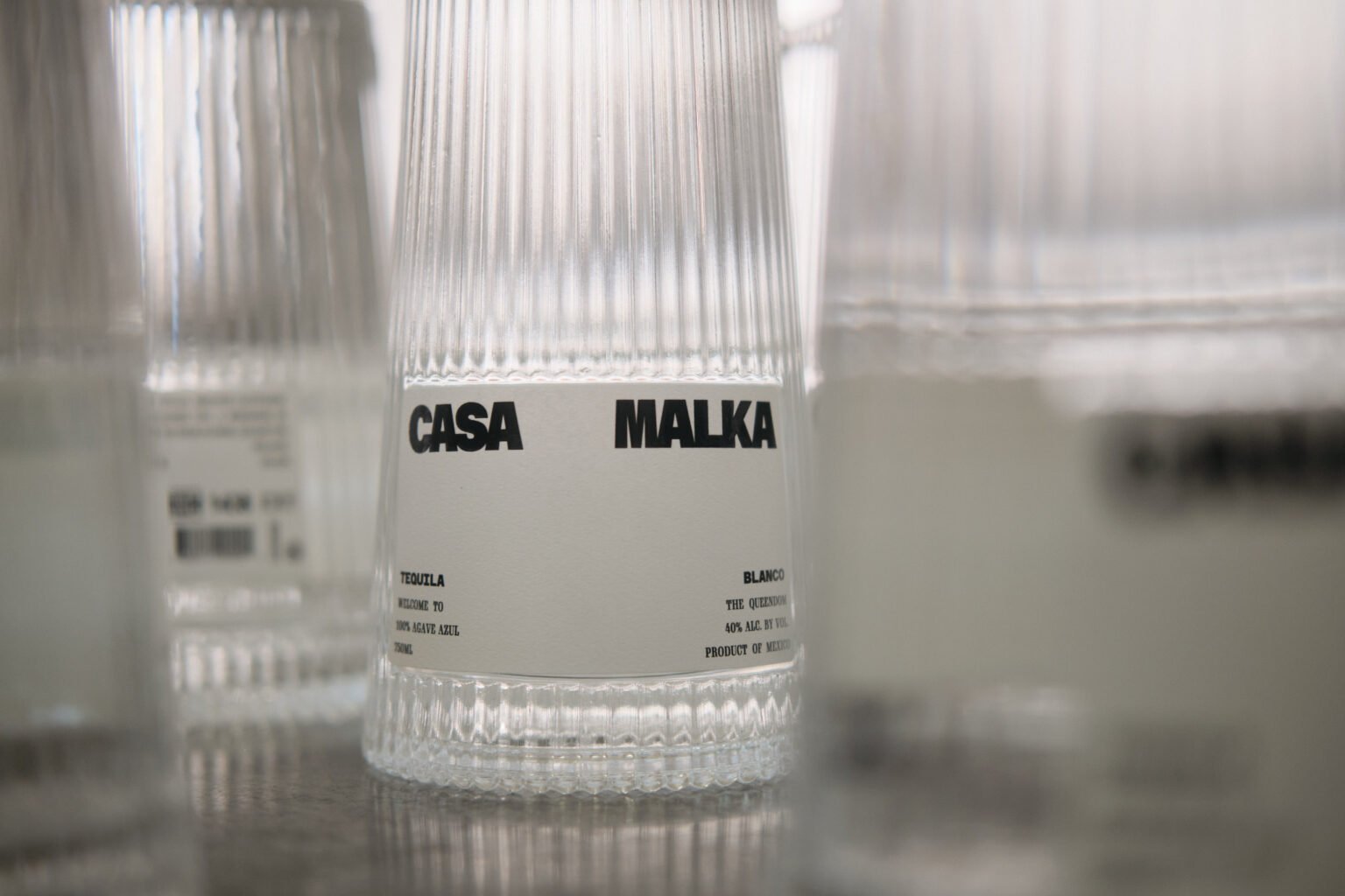 Close-up of multiple Casa Malka Tequila bottles showcasing premium design and craftsmanship